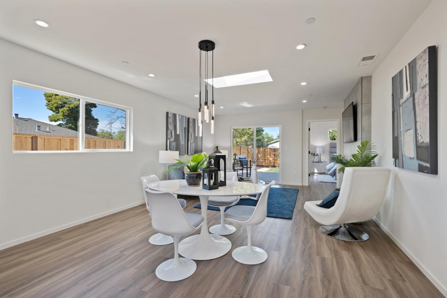 1157 Ruby Street Redwood City, CA 94061 - Photo 11 of 31 a living room with furniture and a wooden floor