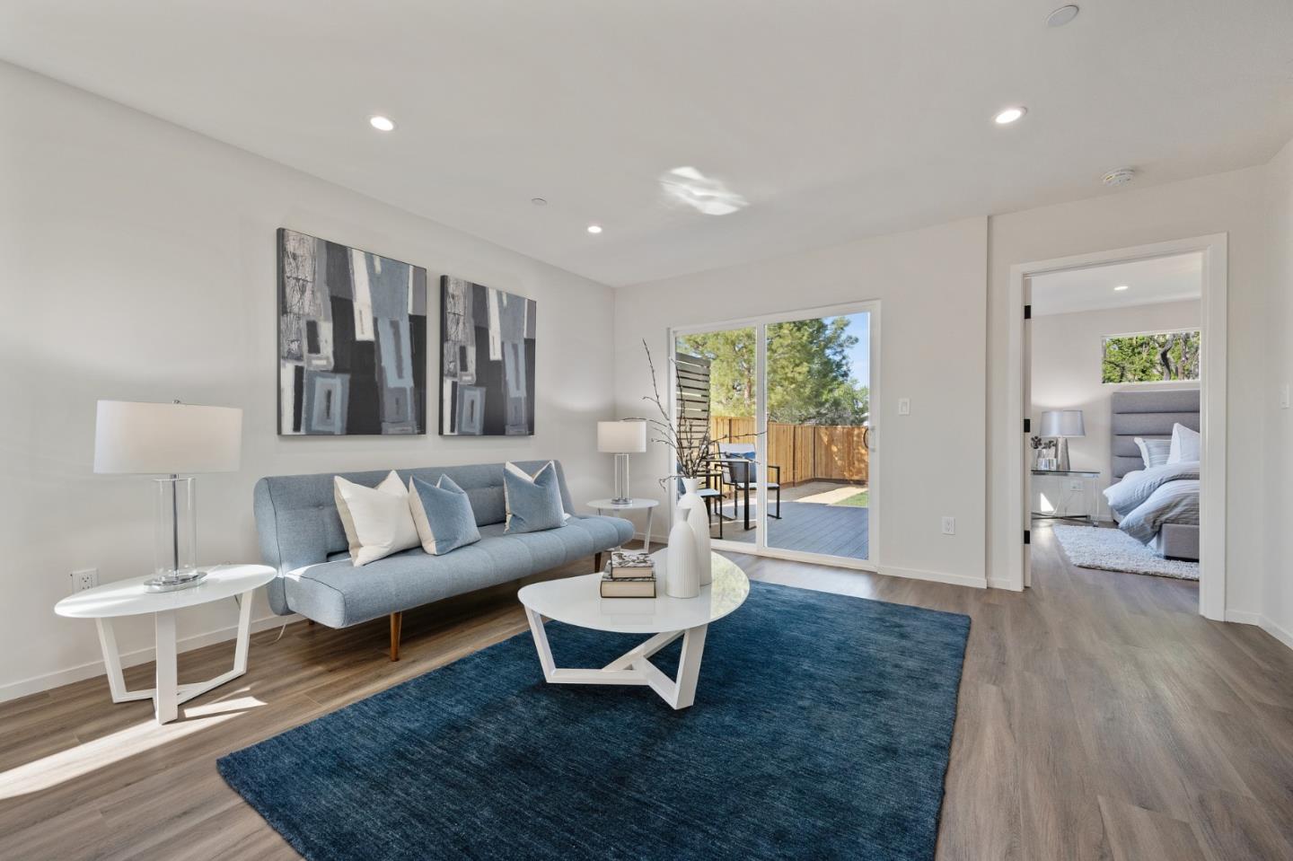 1157 Ruby Street Redwood City, CA 94061 - Photo 13 of 31 a living room with furniture and a table