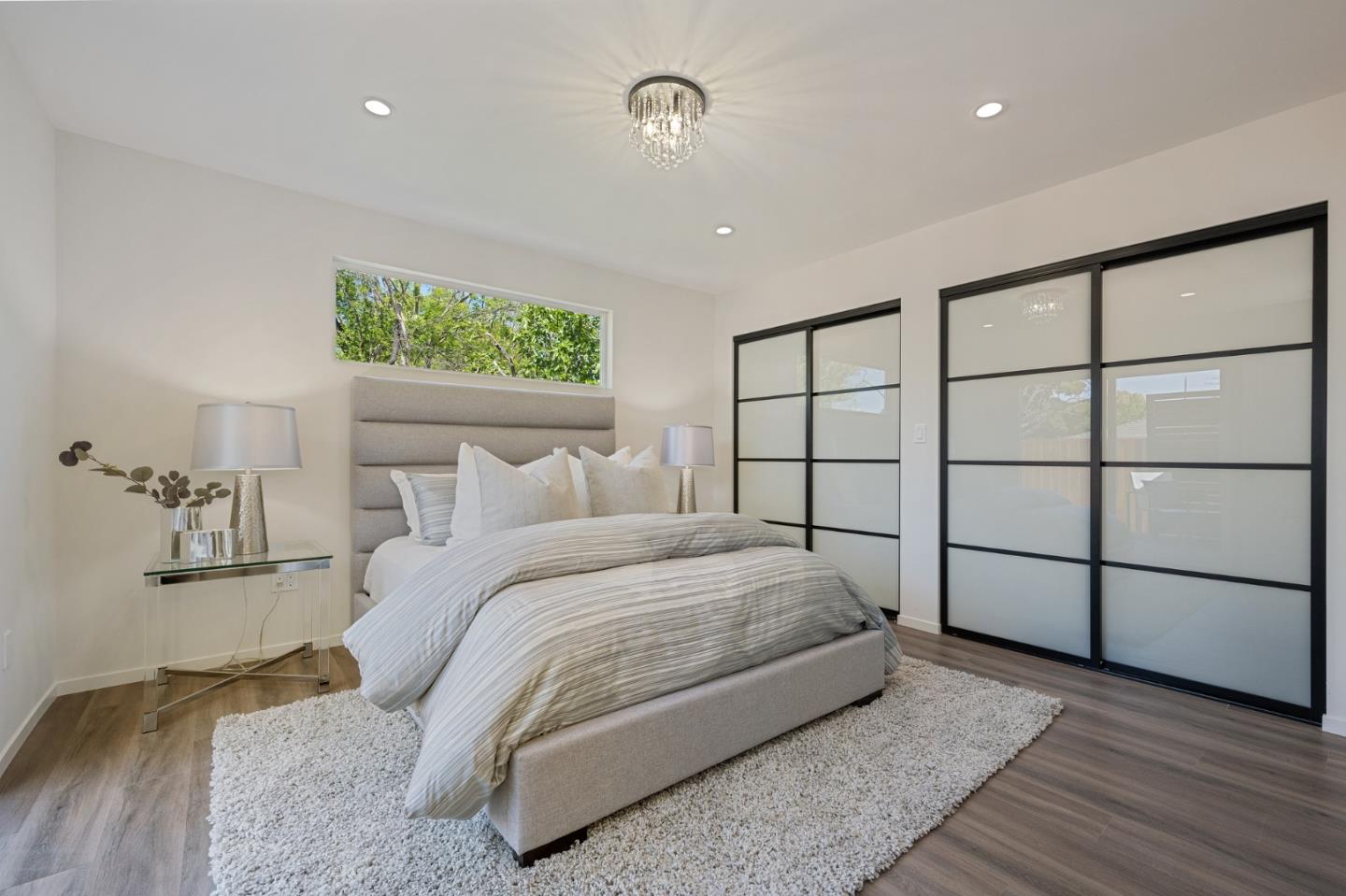 1157 Ruby Street Redwood City, CA 94061 - Photo 15 of 31 a bedroom with a bed and a window