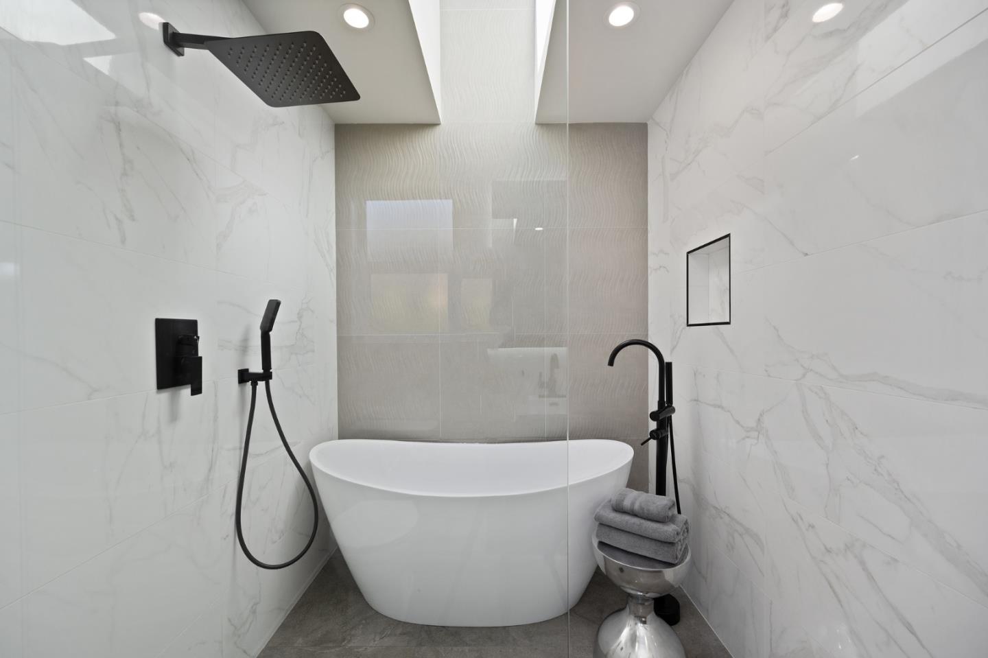 1157 Ruby Street Redwood City, CA 94061 - Photo 19 of 31 a white bath tub sitting next to a shower
