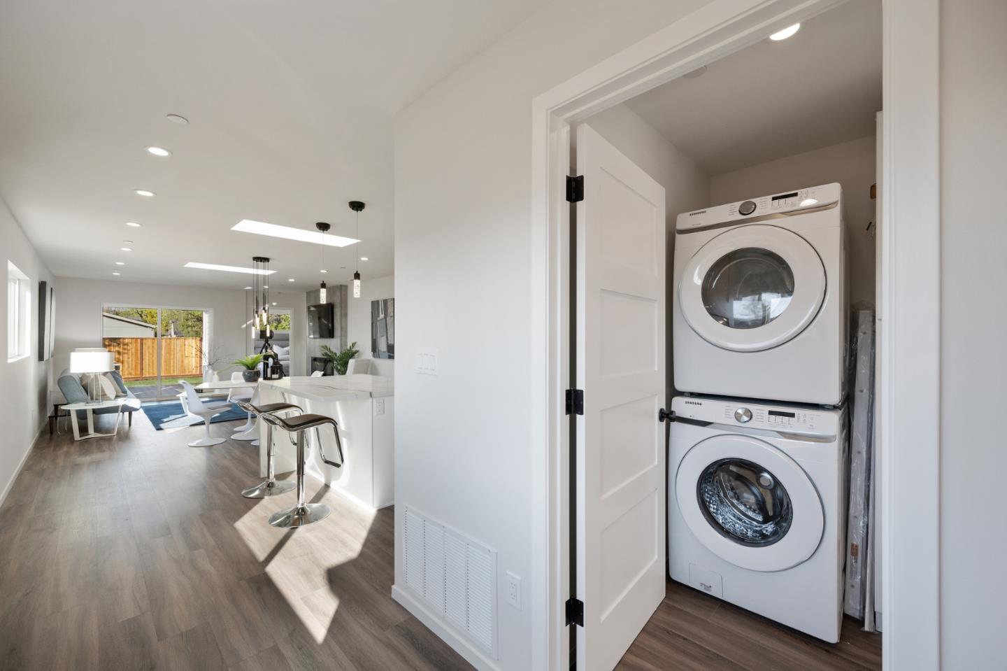 1157 Ruby Street Redwood City, CA 94061 - Photo 23 of 31 a view of a living room washer and dryer in a living room