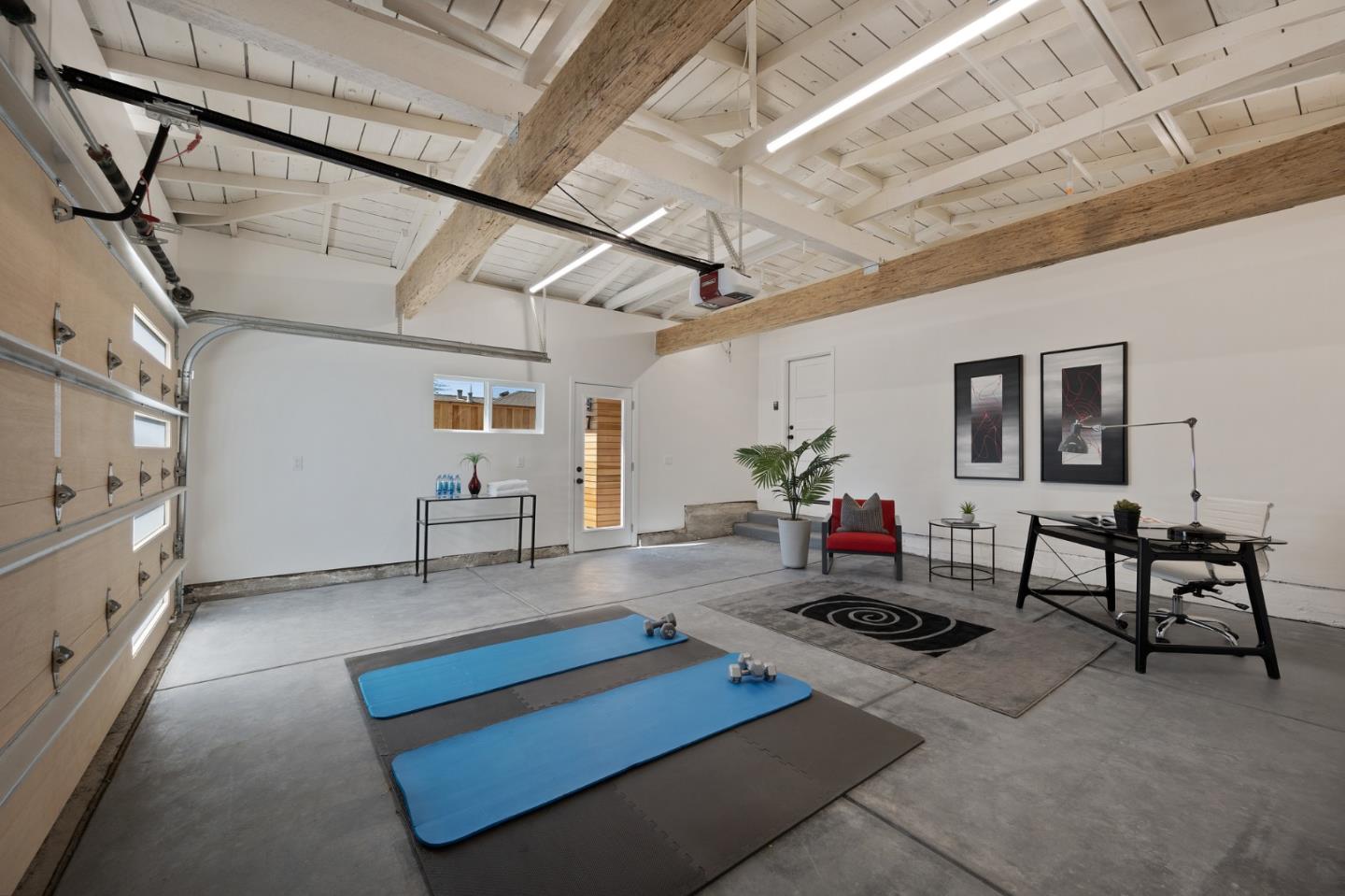 1157 Ruby Street Redwood City, CA 94061 - Photo 24 of 31 a living room with furniture gym equipment and a rug
