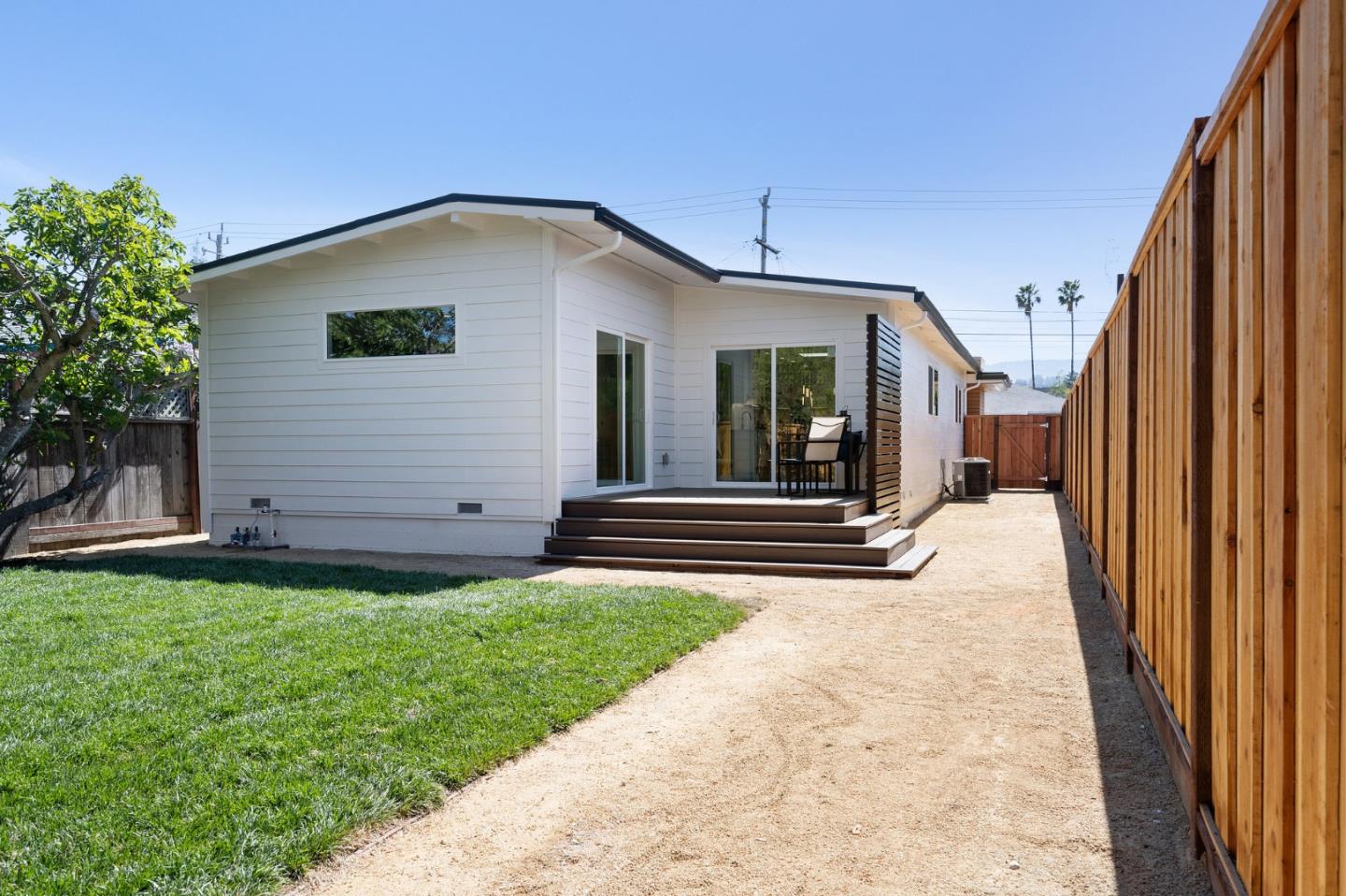 1157 Ruby Street Redwood City, CA 94061 - Photo 28 of 31 a view of a house with backyard and garden