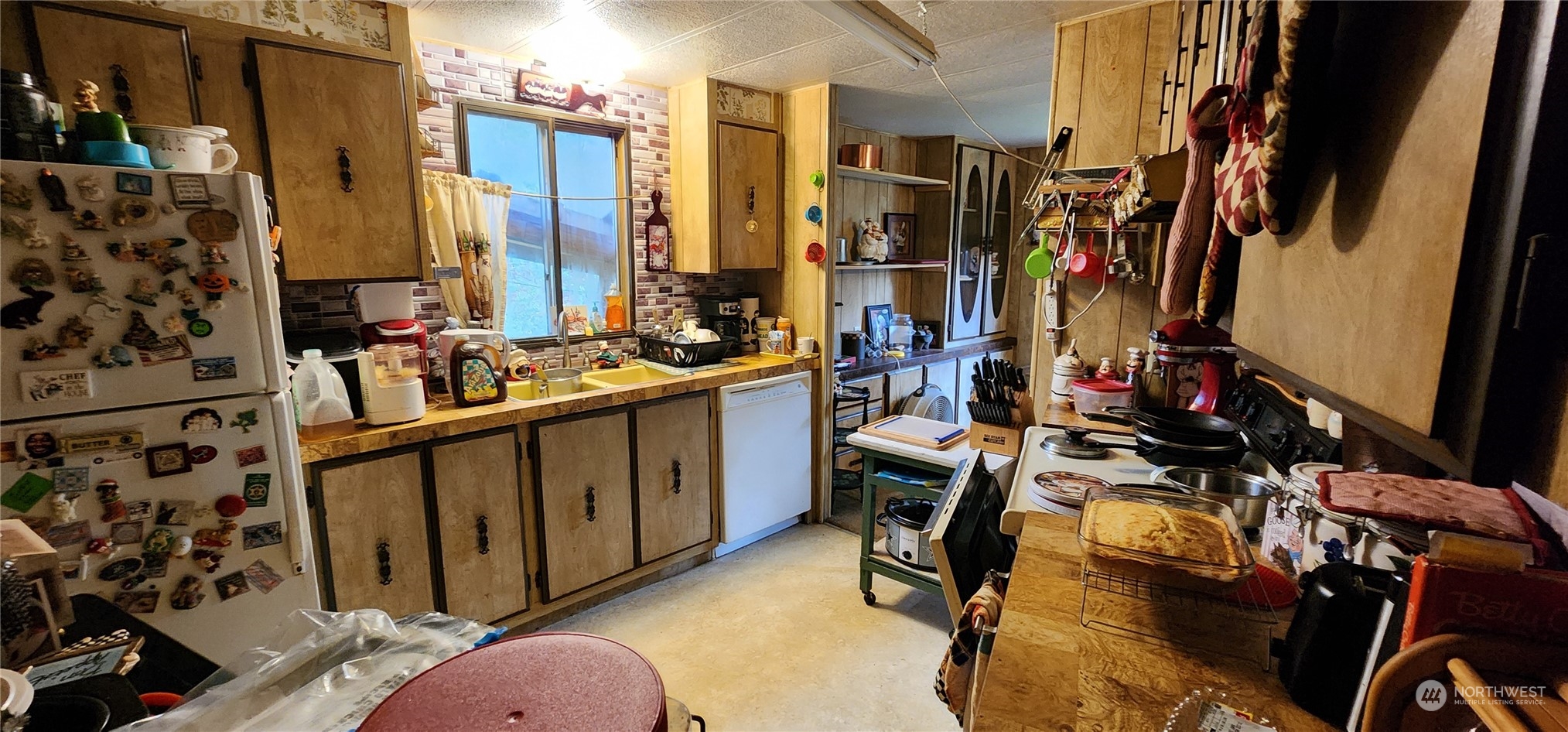 91 Maple Street Quilcene, WA 98376 - Photo 3 of 14 a view of walk in closet with clothes
