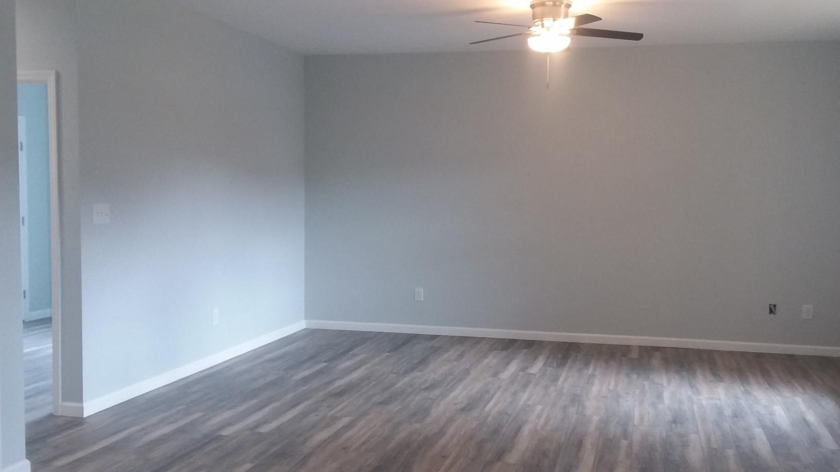 6019 Old Rutledge Pike Corryton, TN 37721 - Photo 4 of 8 a view of a room with wooden floor