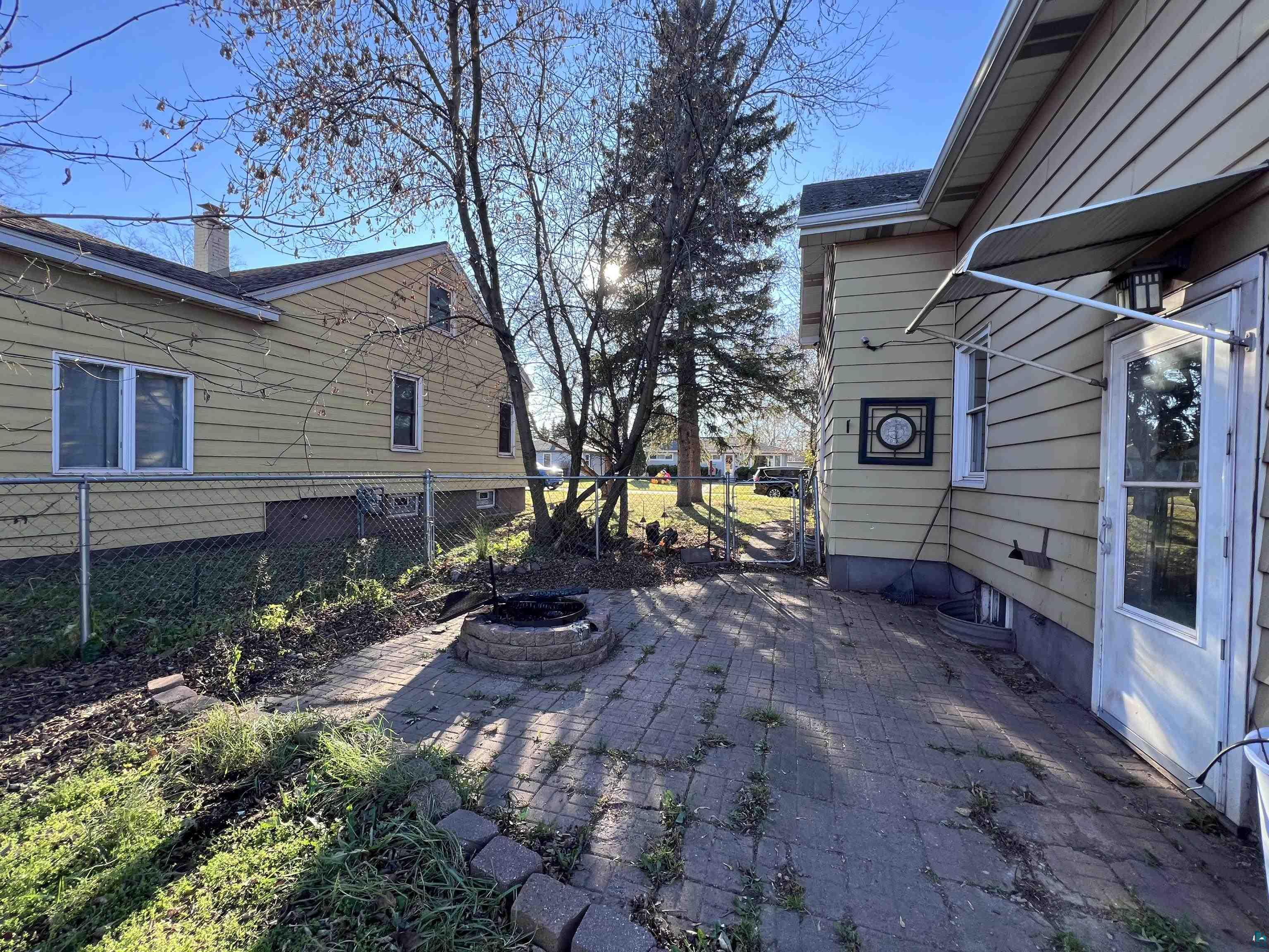 4207 East 3rd Street Superior, WI 54880 - Photo 19 of 23 View of patio / terrace with an outdoor fire pit