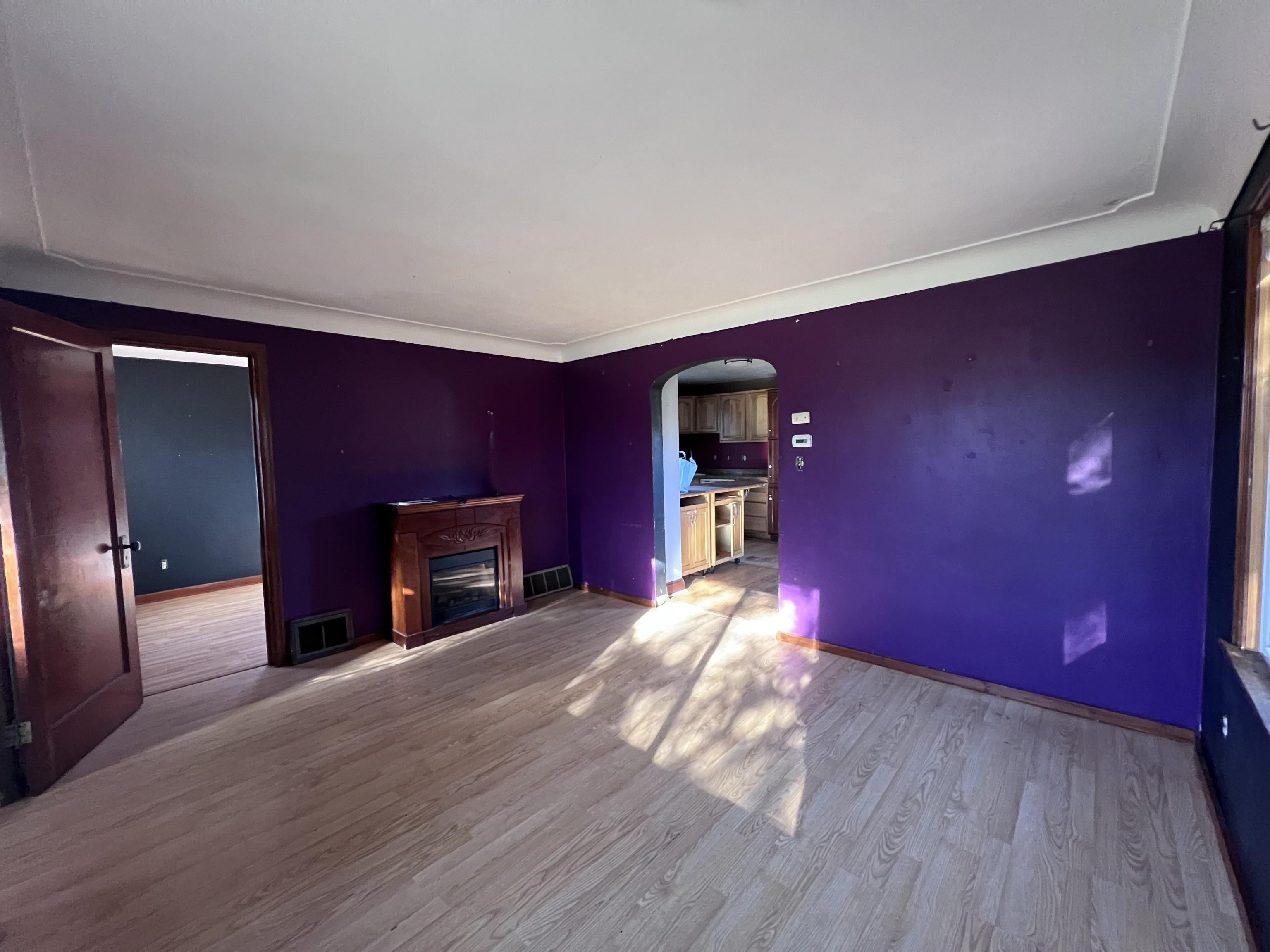 4207 East 3rd Street Superior, WI 54880 - Photo 3 of 23 Unfurnished living room with light hardwood / wood-style floors