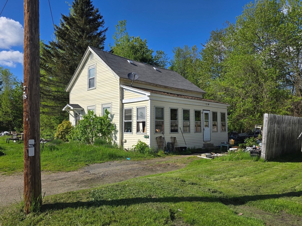 169 Spruce Street Winchendon, MA 01475 - Photo 2 of 3 a view of a house with a yard