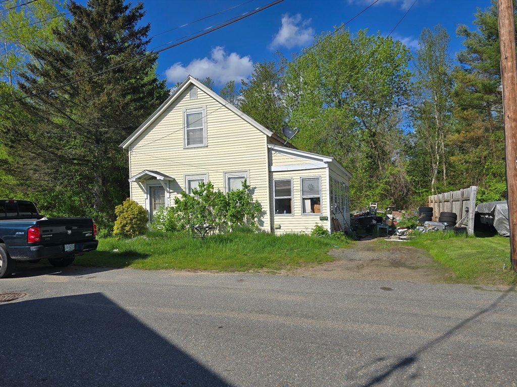 169 Spruce Street Winchendon, MA 01475 - Photo 3 of 3 a view of a house with a yard and garage