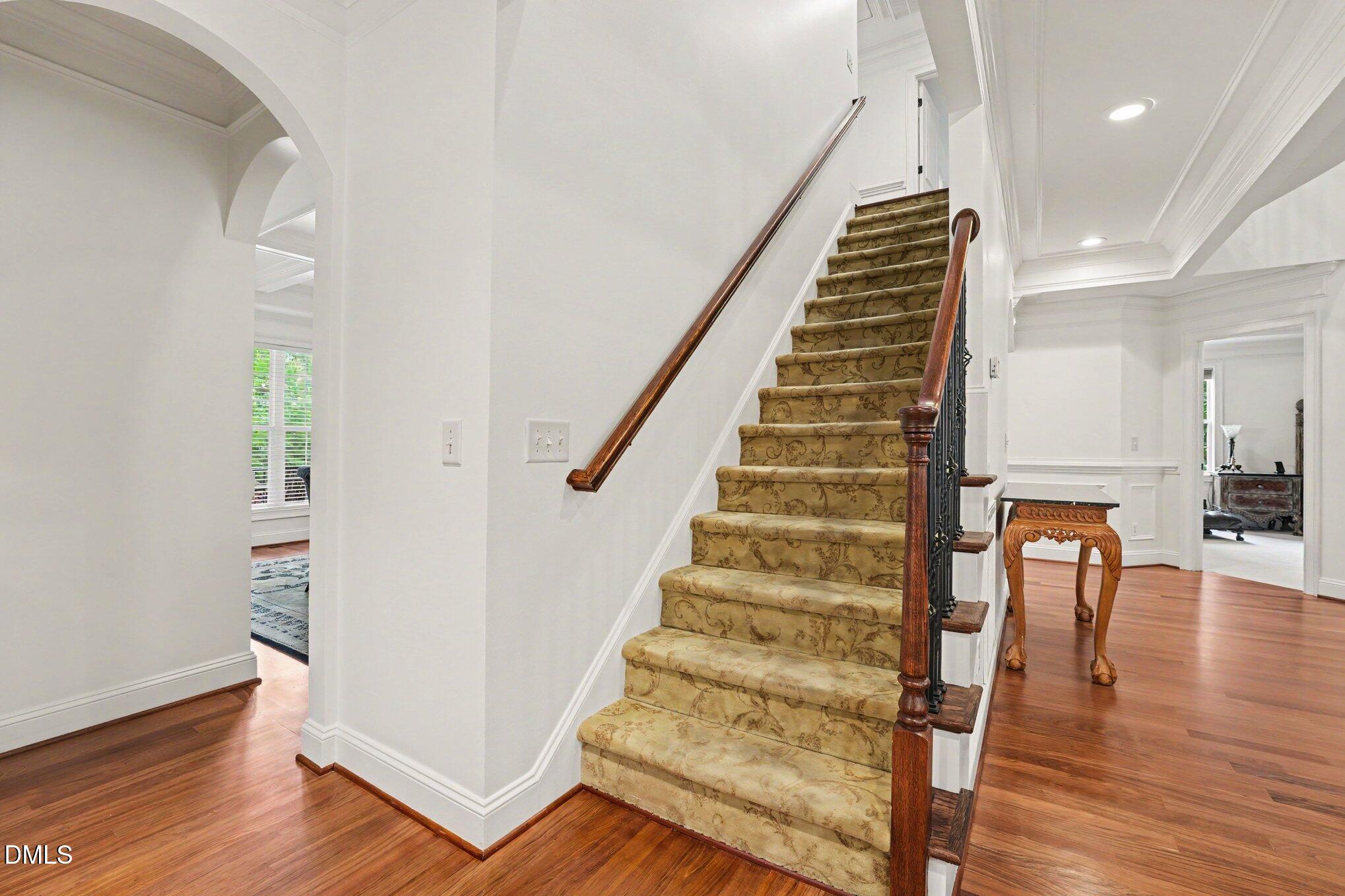 1729 Frenchwood Drive Raleigh, NC 27612 - Photo 19 of 46 a view of entryway and hall with wooden floor