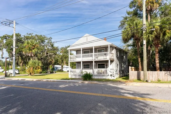 a front view of a building with street view