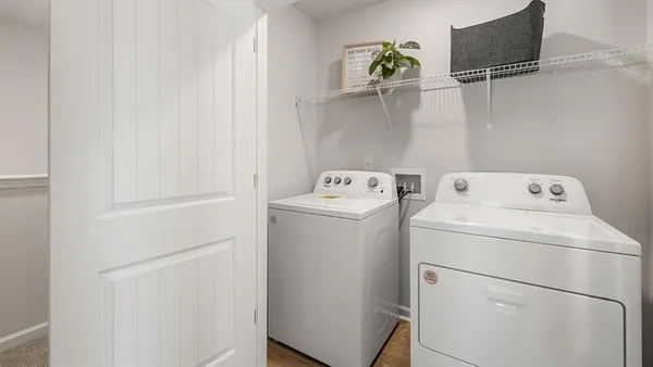 a utility room with dryer and washer