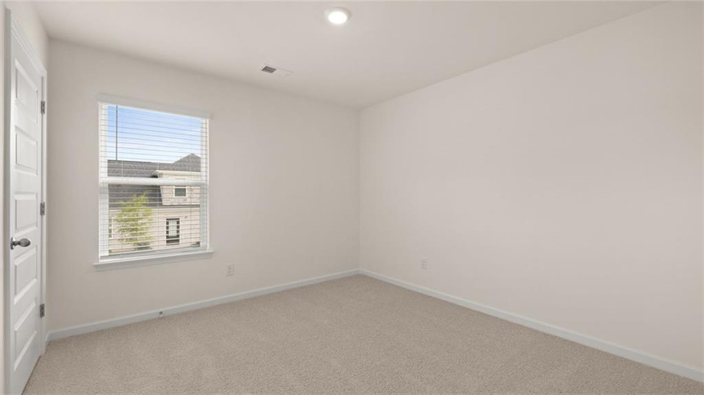 3574 Matthew Court Decatur, GA 30030 - Photo 18 of 18 an empty room with a window