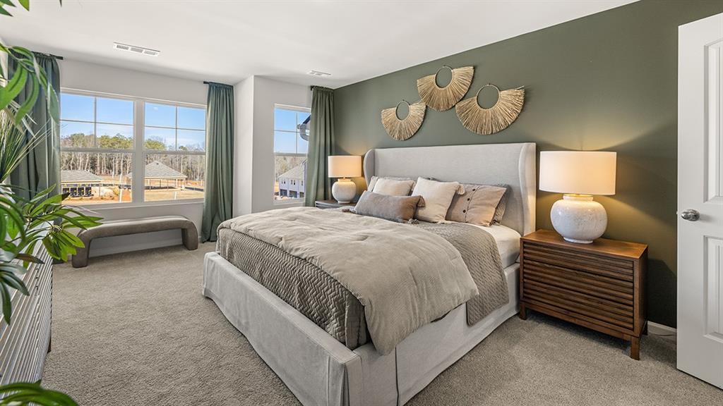 3574 Matthew Court Decatur, GA 30030 - Photo 10 of 18 a spacious bedroom with a bed and a large window