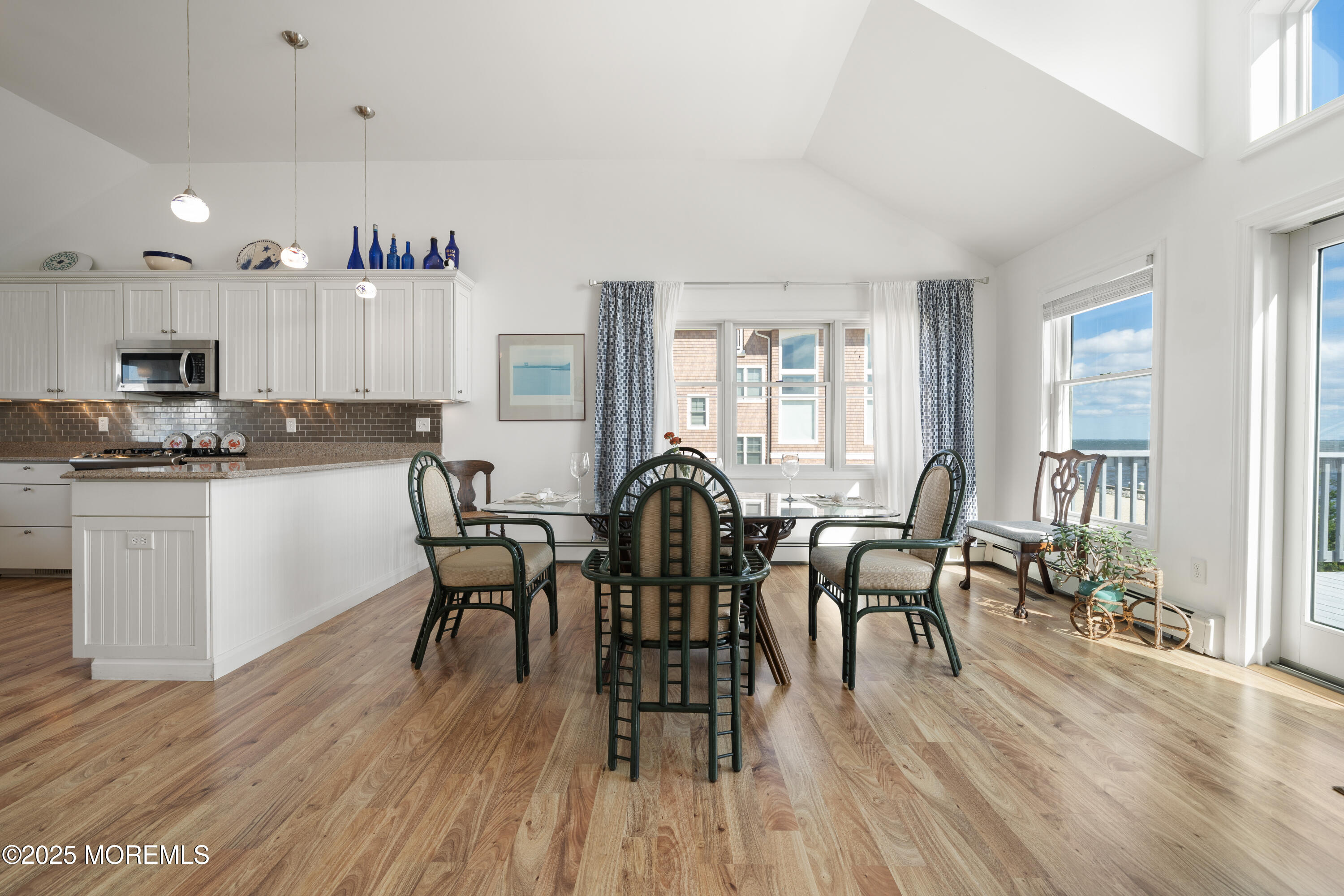 76 Sheridan Street Waretown, NJ 08758 - Photo 13 of 51 a dining room with furniture and wooden floor