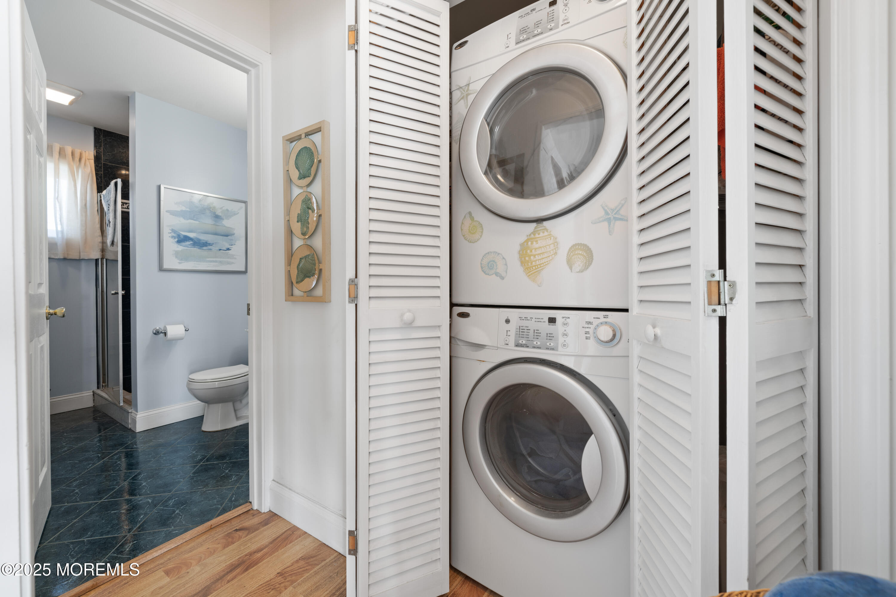 76 Sheridan Street Waretown, NJ 08758 - Photo 20 of 51 a view of a hallway with washer and dryer
