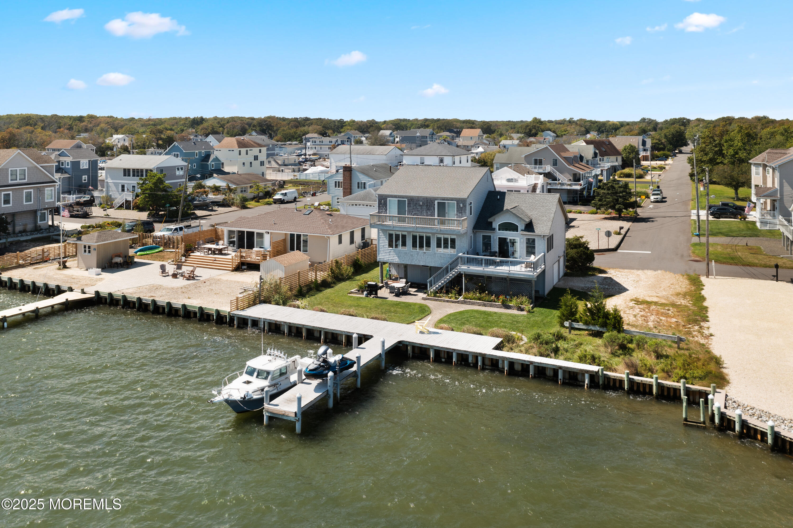 76 Sheridan Street Waretown, NJ 08758 - Photo 2 of 51 a view of a lake with a mountain view