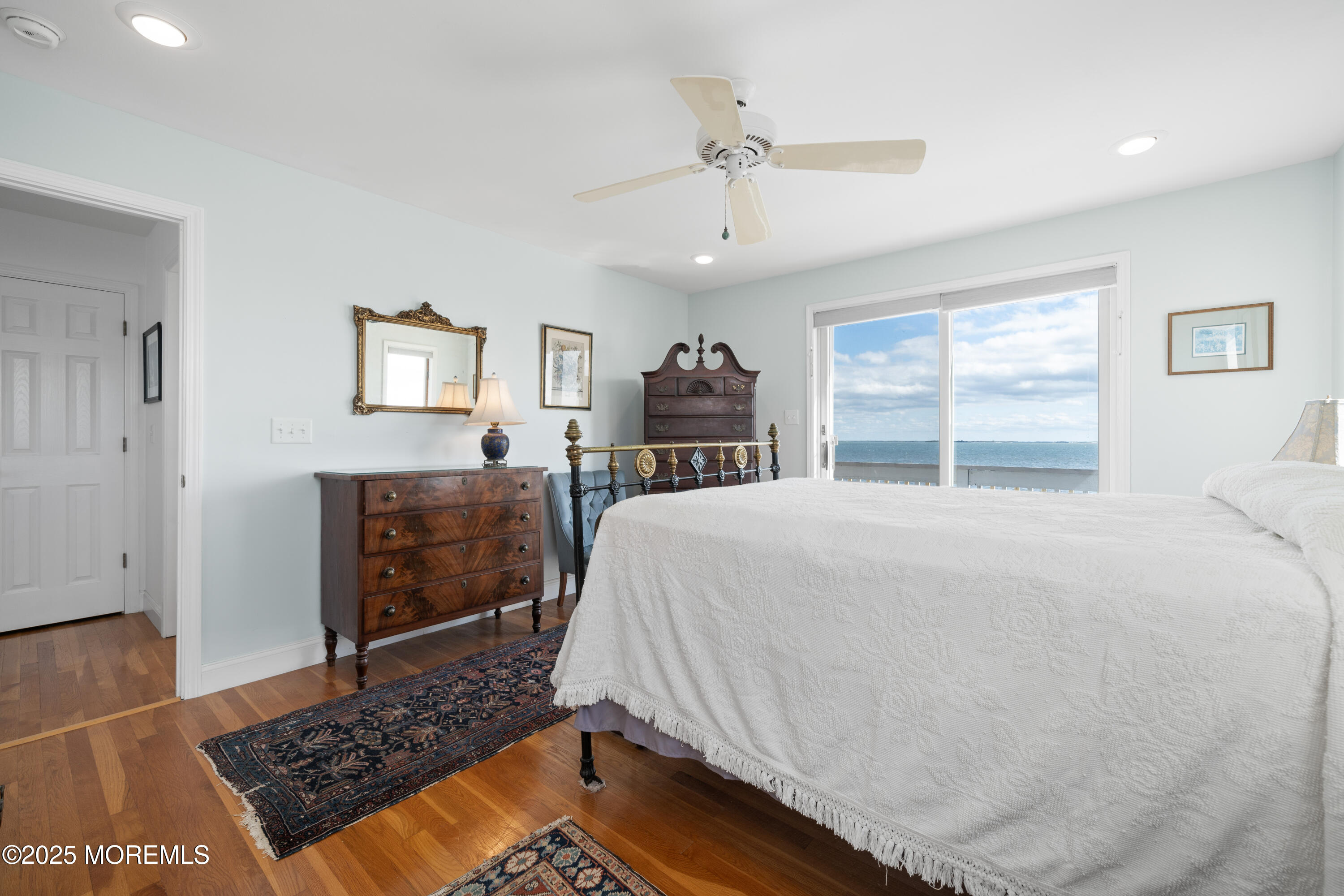76 Sheridan Street Waretown, NJ 08758 - Photo 28 of 51 a spacious bedroom with a bed and a dresser in it