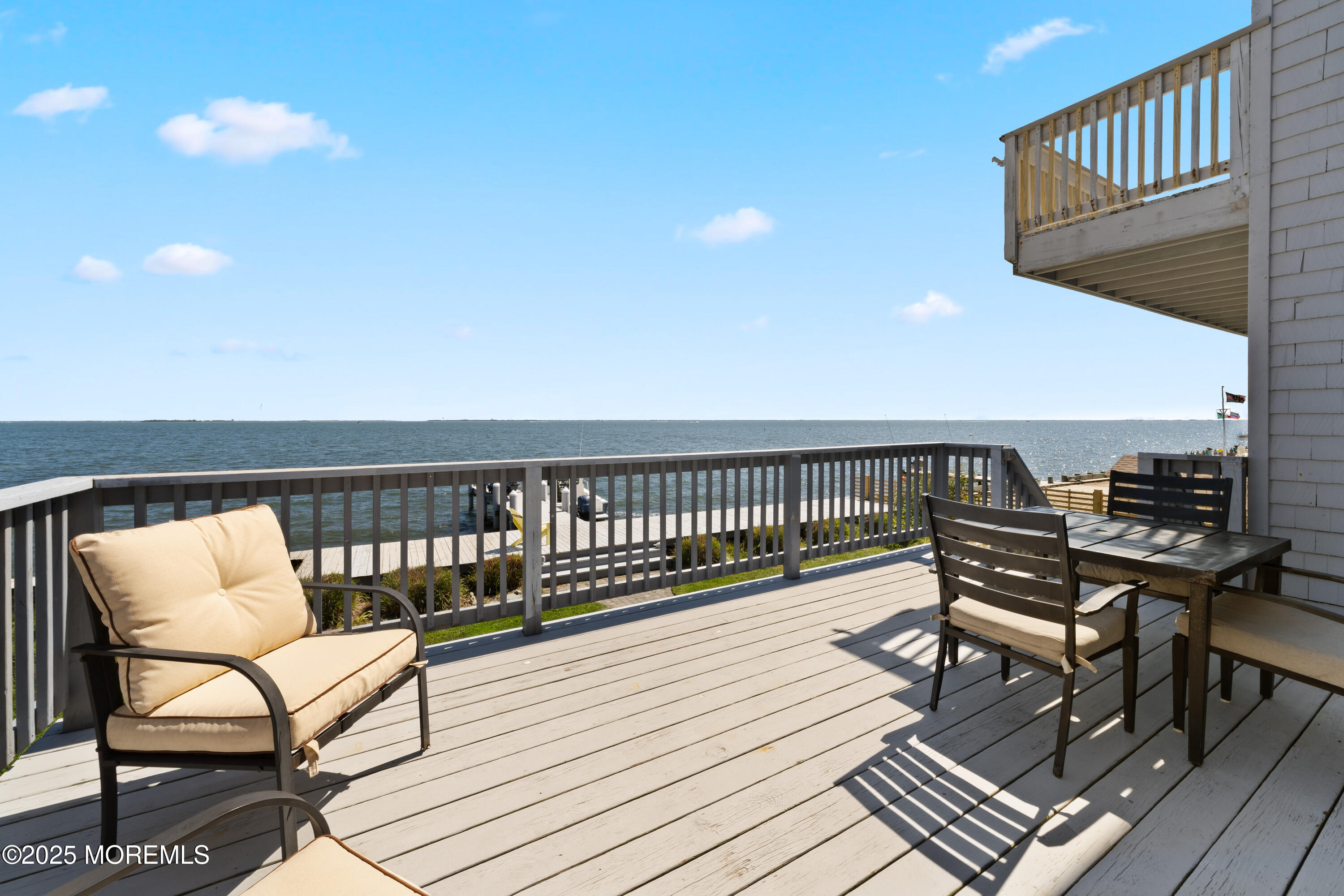 76 Sheridan Street Waretown, NJ 08758 - Photo 39 of 51 a view of a roof deck with furniture