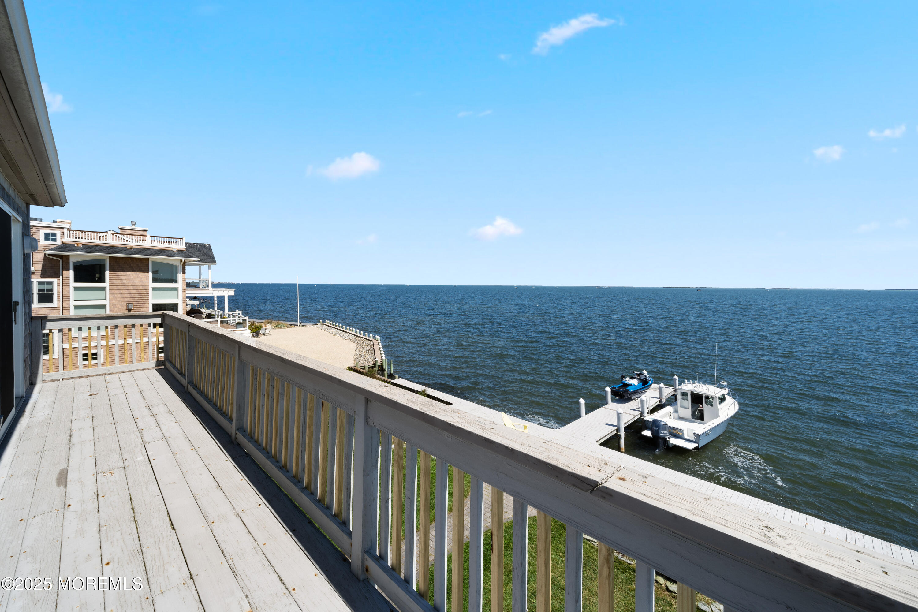 76 Sheridan Street Waretown, NJ 08758 - Photo 40 of 51 a view of a balcony with two chairs