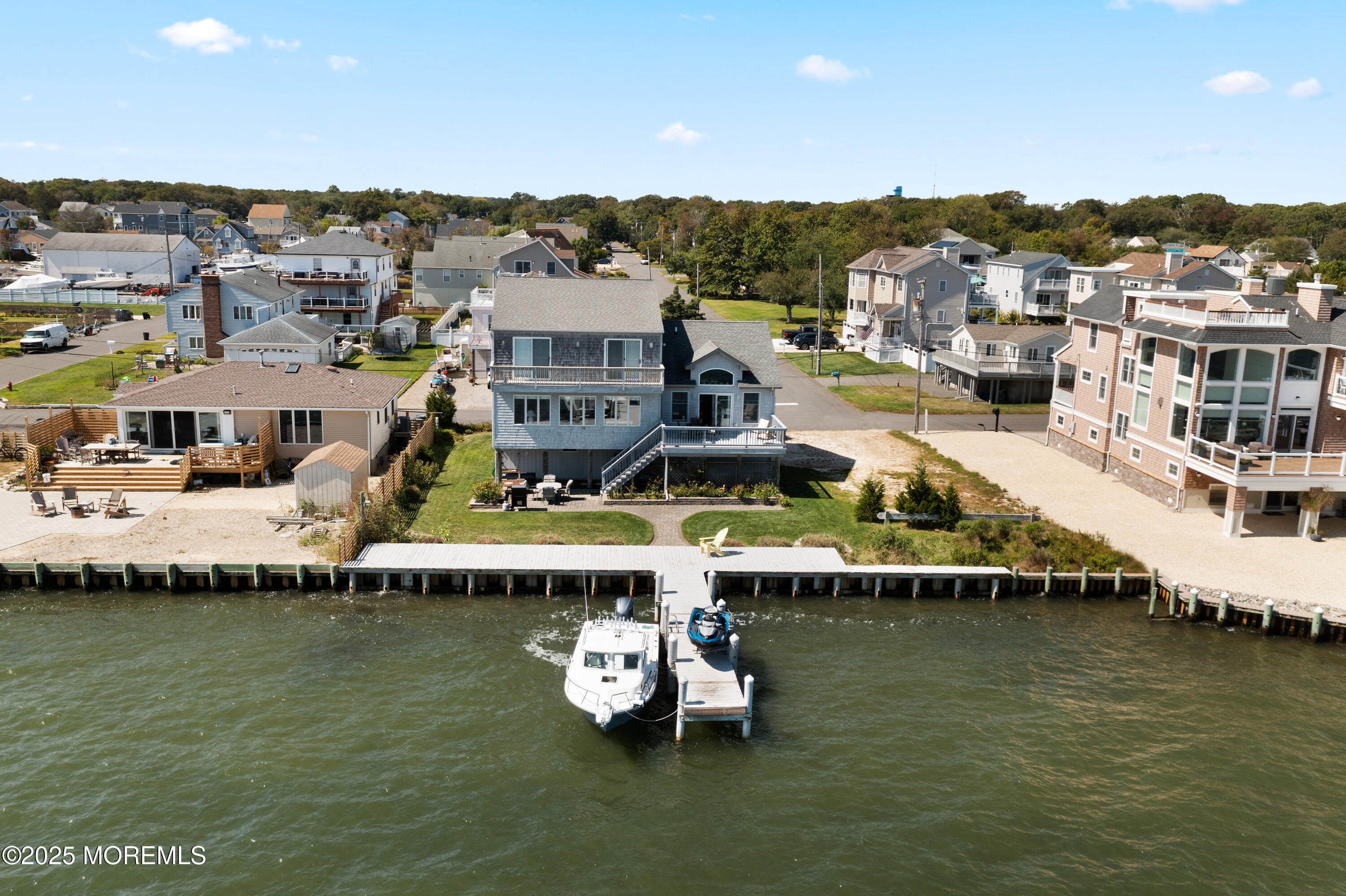 76 Sheridan Street Waretown, NJ 08758 - Photo 42 of 51 a view of a lake with a nearby beach