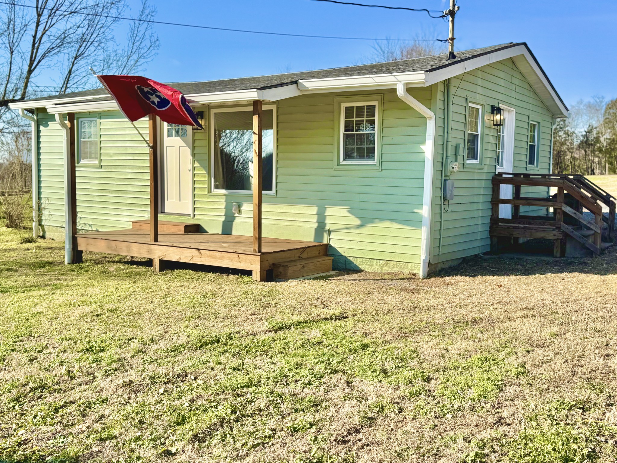 8649 Taliaferro Road Eagleville, TN 37060 - Photo 15 of 24 a front view of a house with a yard