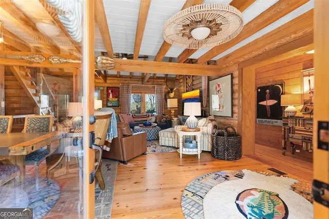 a kitchen with stainless steel appliances granite countertop a sink and dishwasher a oven with wooden cabinets