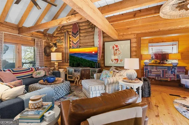 a view of a kitchen with granite countertop a sink and a stove