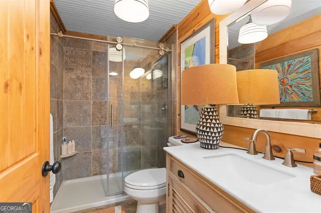 a view of swimming pool with a patio