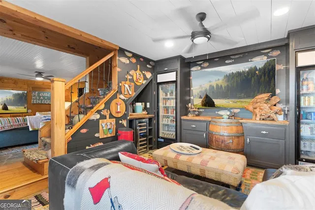 a bedroom with two beds and a couch