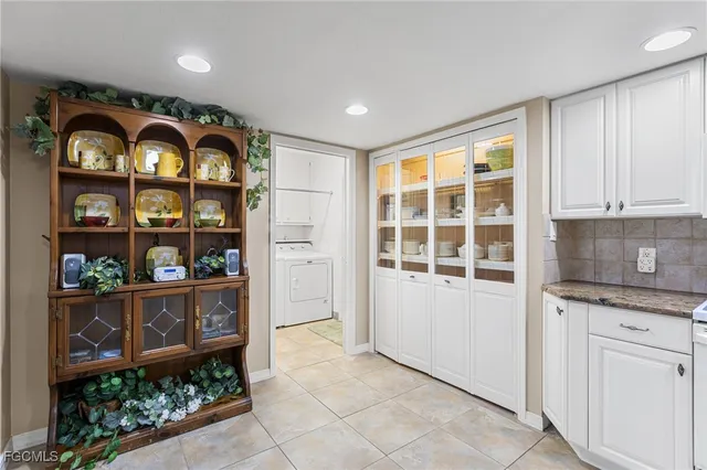 a front view of a house with wooden floor and a window