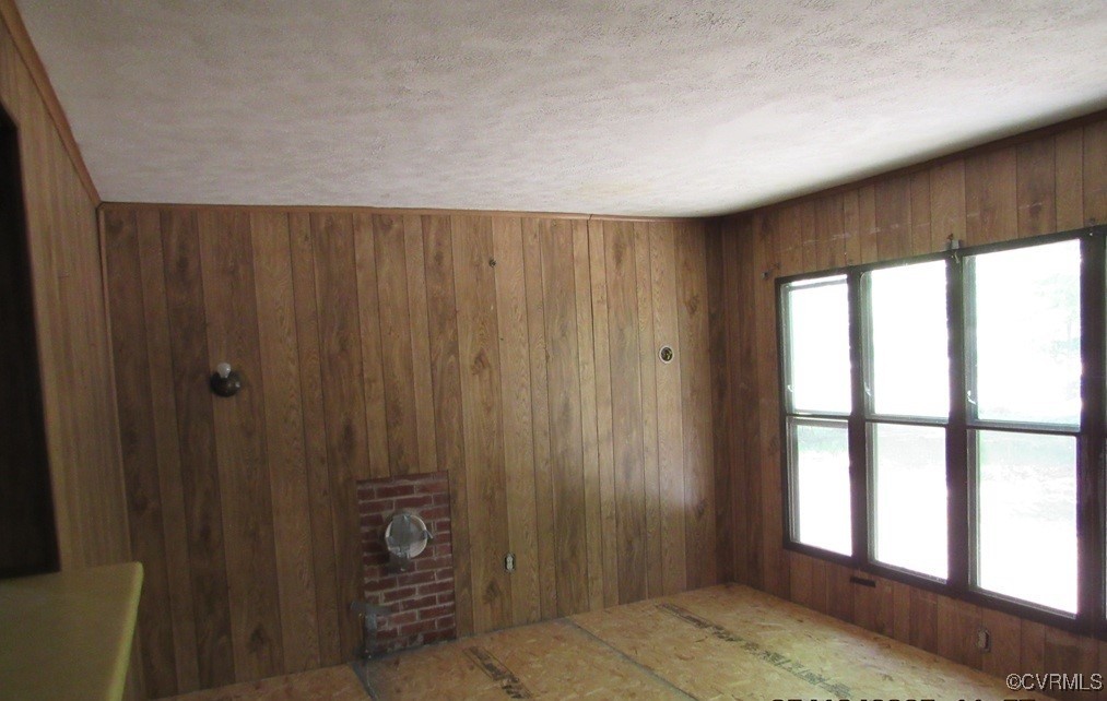27701 Prince Edward Highway Rice, VA 23966 - Photo 15 of 21 Spare room featuring plenty of natural light, wood