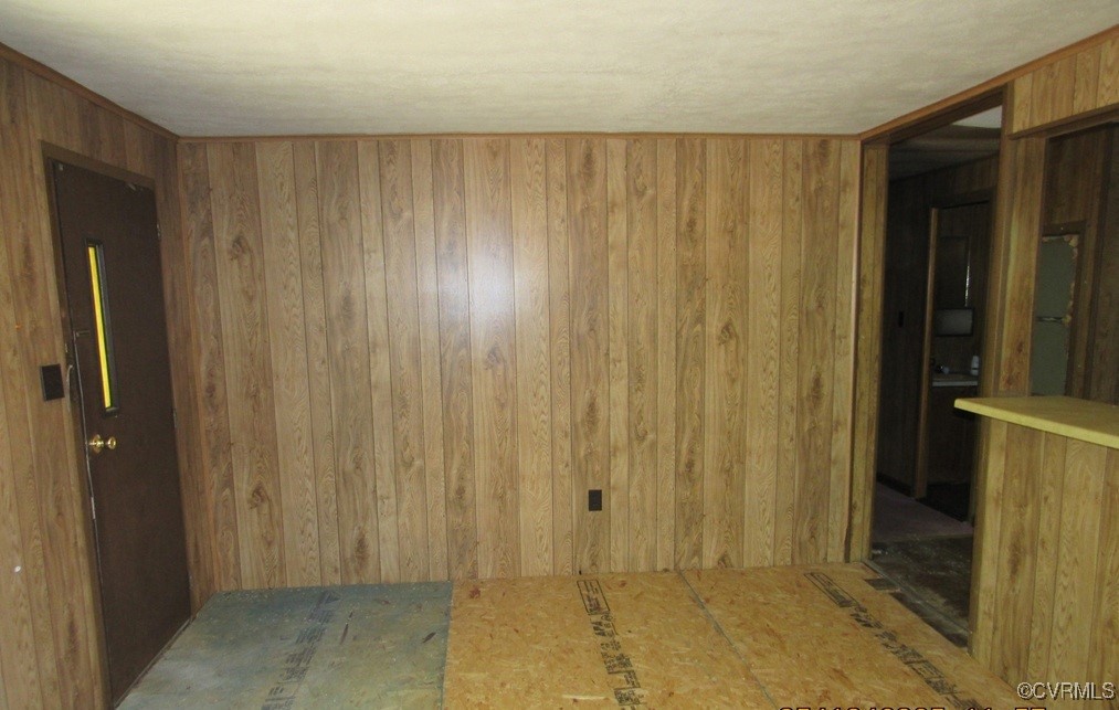 27701 Prince Edward Highway Rice, VA 23966 - Photo 16 of 21 Spare room featuring wood walls