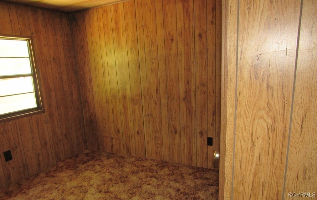 27701 Prince Edward Highway Rice, VA 23966 - Photo 20 of 21 Carpeted empty room featuring wooden walls