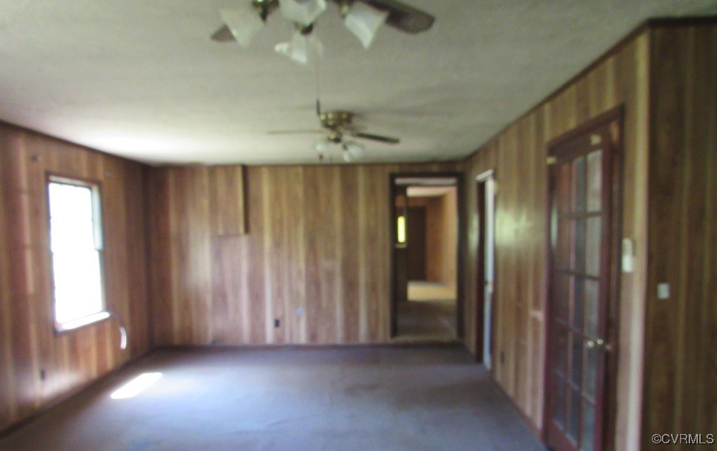 27701 Prince Edward Highway Rice, VA 23966 - Photo 8 of 21 Carpeted empty room featuring a ceiling fan and wo