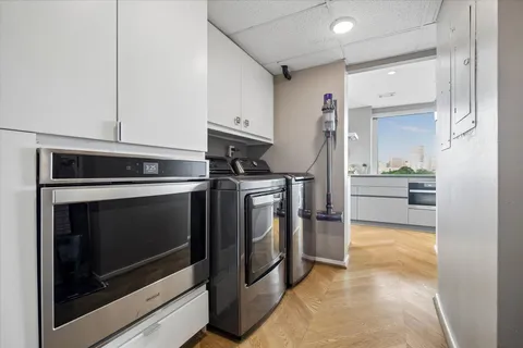 a kitchen with a stove and a refrigerator