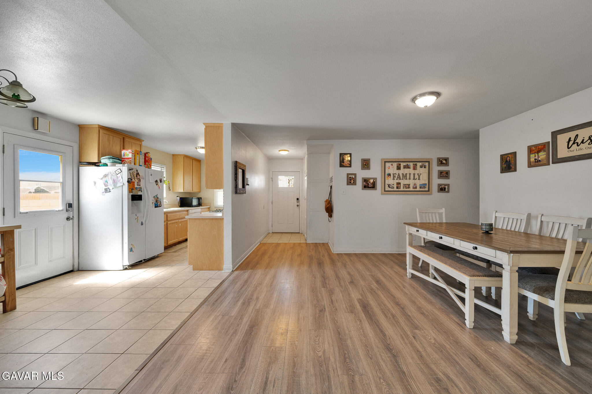 44188 Glenraven Road Lancaster, CA 93535 - Photo 5 of 26 a view of kitchen with furniture and wooden floor