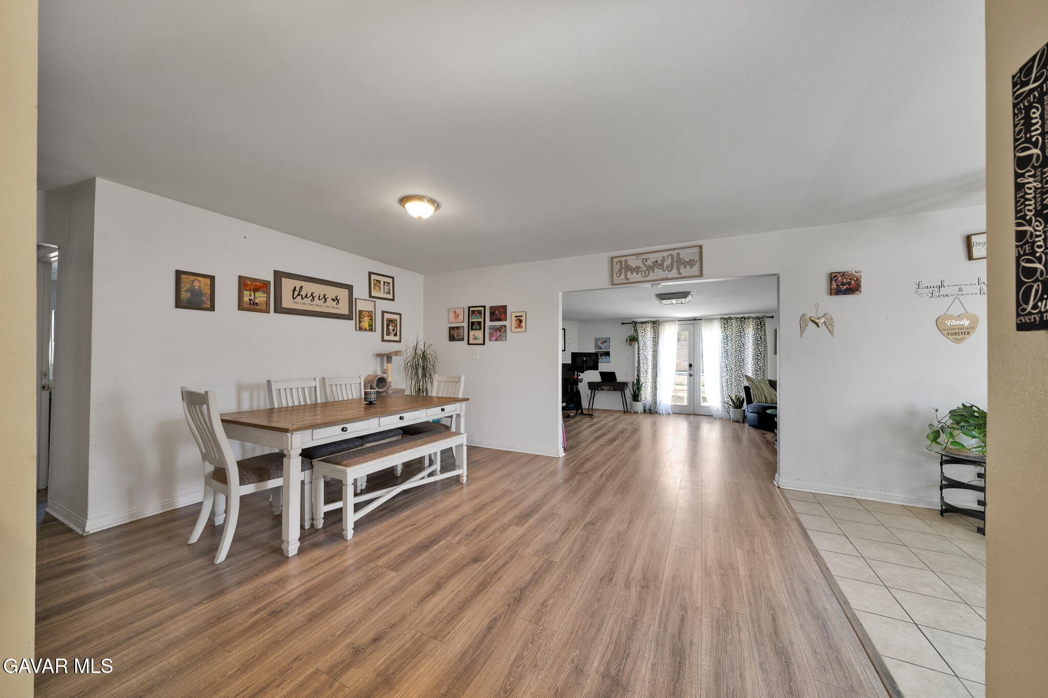 44188 Glenraven Road Lancaster, CA 93535 - Photo 9 of 26 a view of a living room and dining room