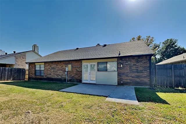a front view of a house with yard