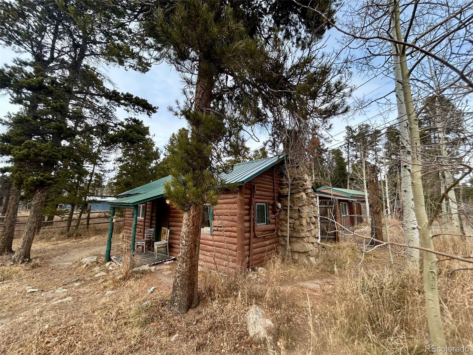 27 Gap Road Black Hawk, CO 80422 - Photo 15 of 18 front view of a house with a tree