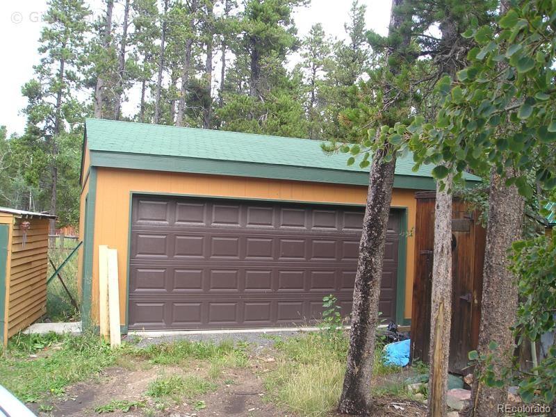 27 Gap Road Black Hawk, CO 80422 - Photo 16 of 18 a front view of a house with a tree
