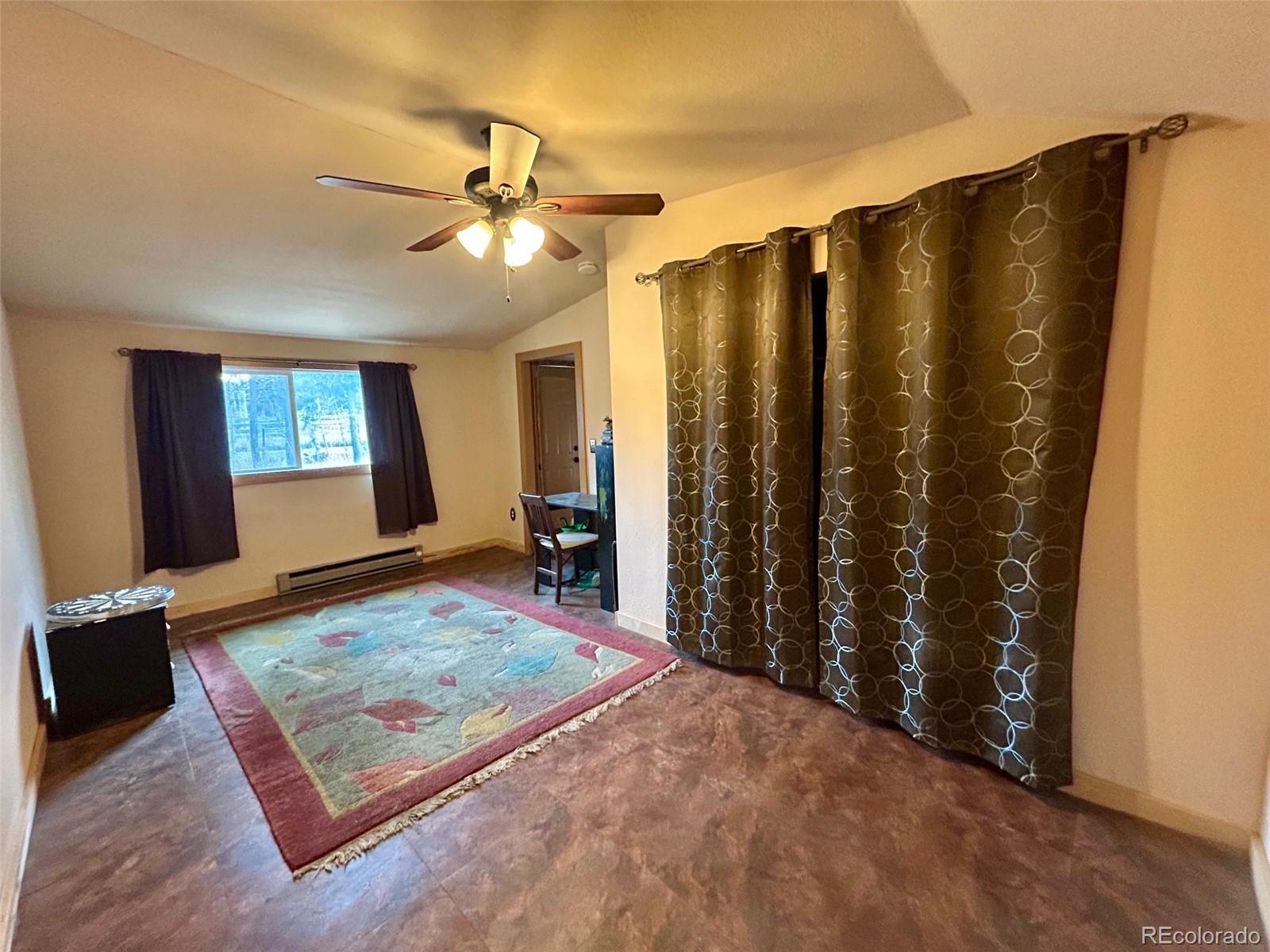 27 Gap Road Black Hawk, CO 80422 - Photo 8 of 18 a view of a bedroom and window
