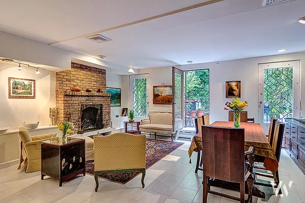a view of a livingroom with furniture window and outside view