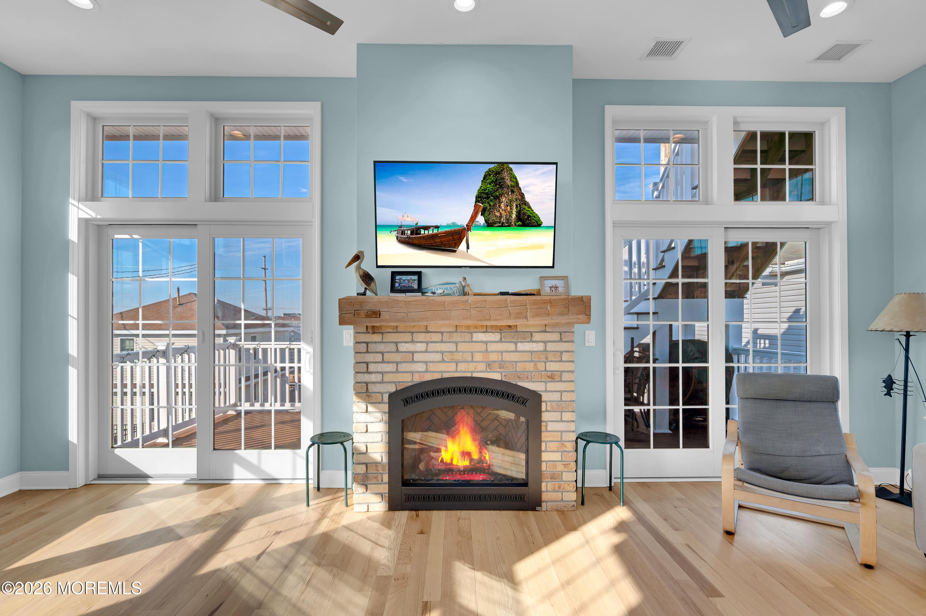 170 West Beach Way Lavallette, NJ 08735 - Photo 21 of 71 a living room with furniture and a fireplace