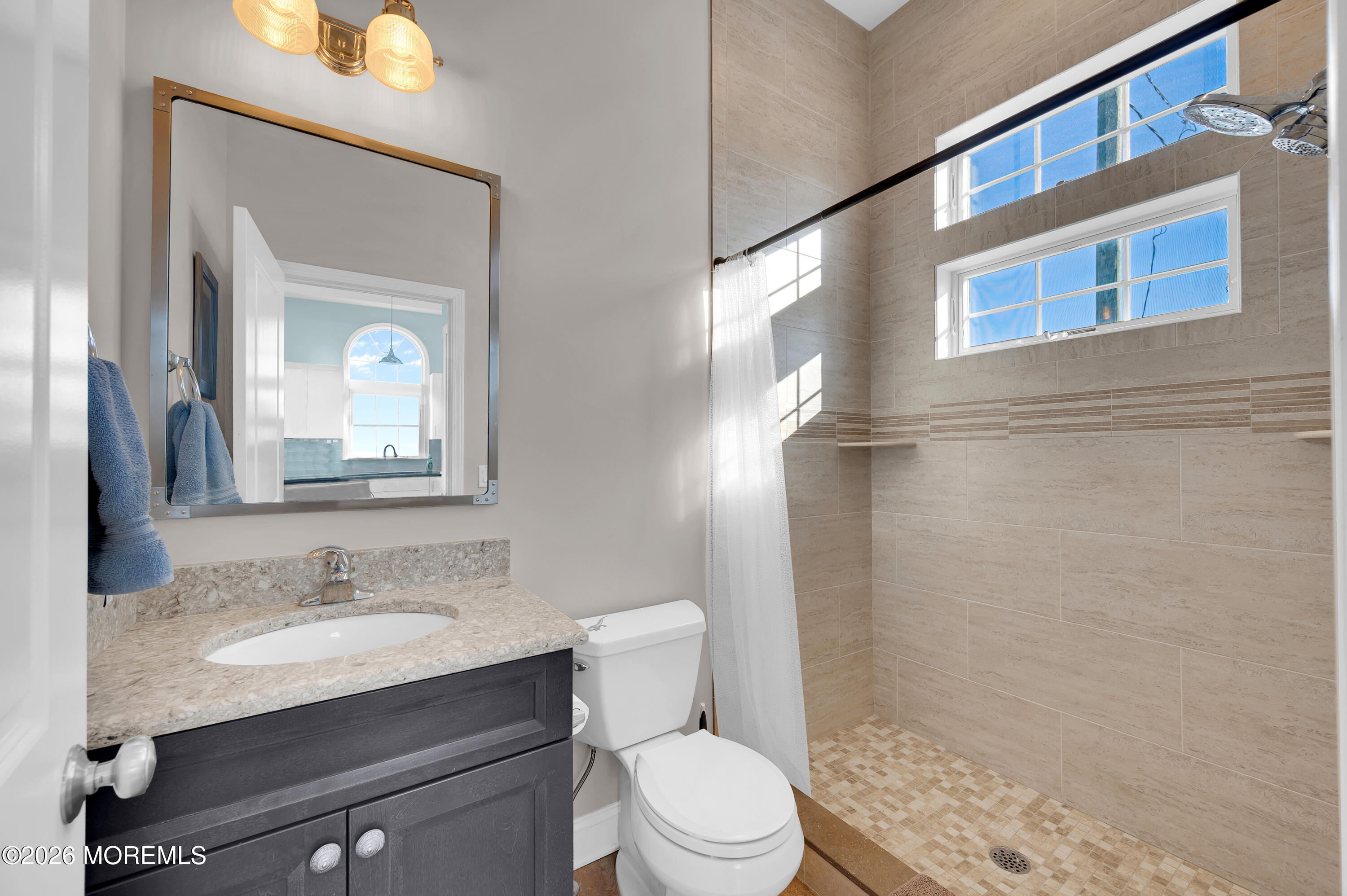 170 West Beach Way Lavallette, NJ 08735 - Photo 27 of 71 a bathroom with a granite countertop sink toilet and shower