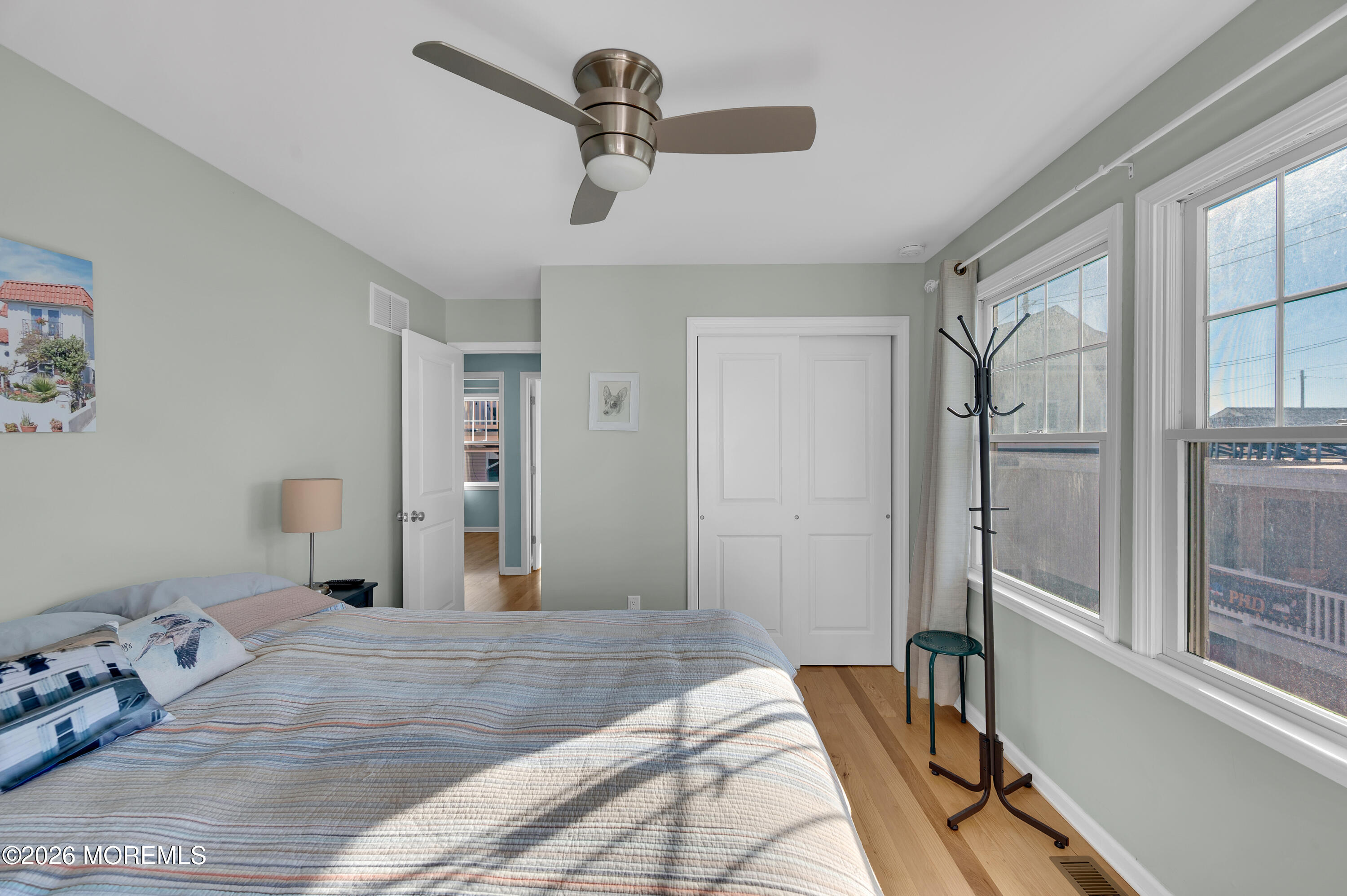 170 West Beach Way Lavallette, NJ 08735 - Photo 29 of 71 a bedroom with a bed and a large mirror