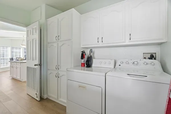 a utility room with dryer and washer