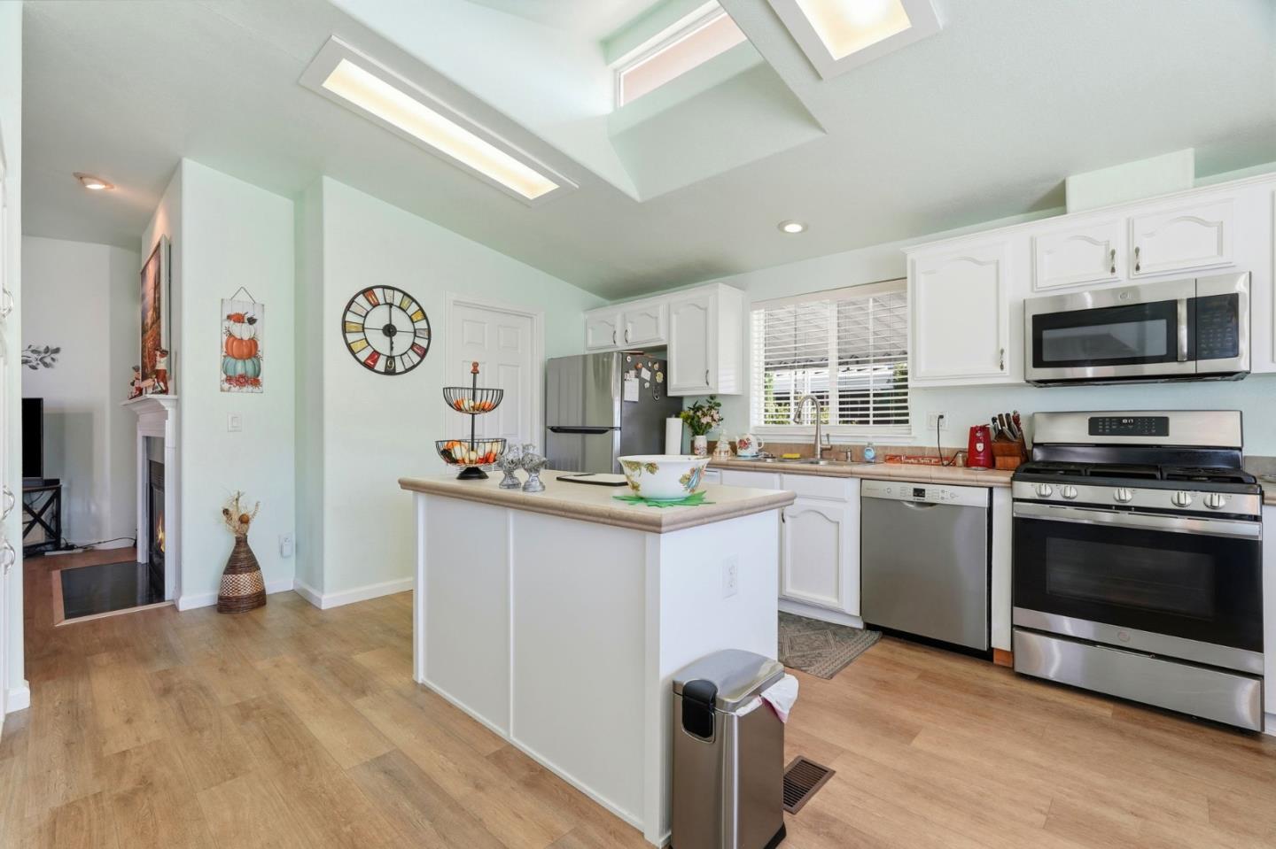 845 Villa Teresa Way, Unit 845 San Jose, CA 95123 - Photo 9 of 34 a kitchen with stainless steel appliances granite countertop a refrigerator and a stove top oven