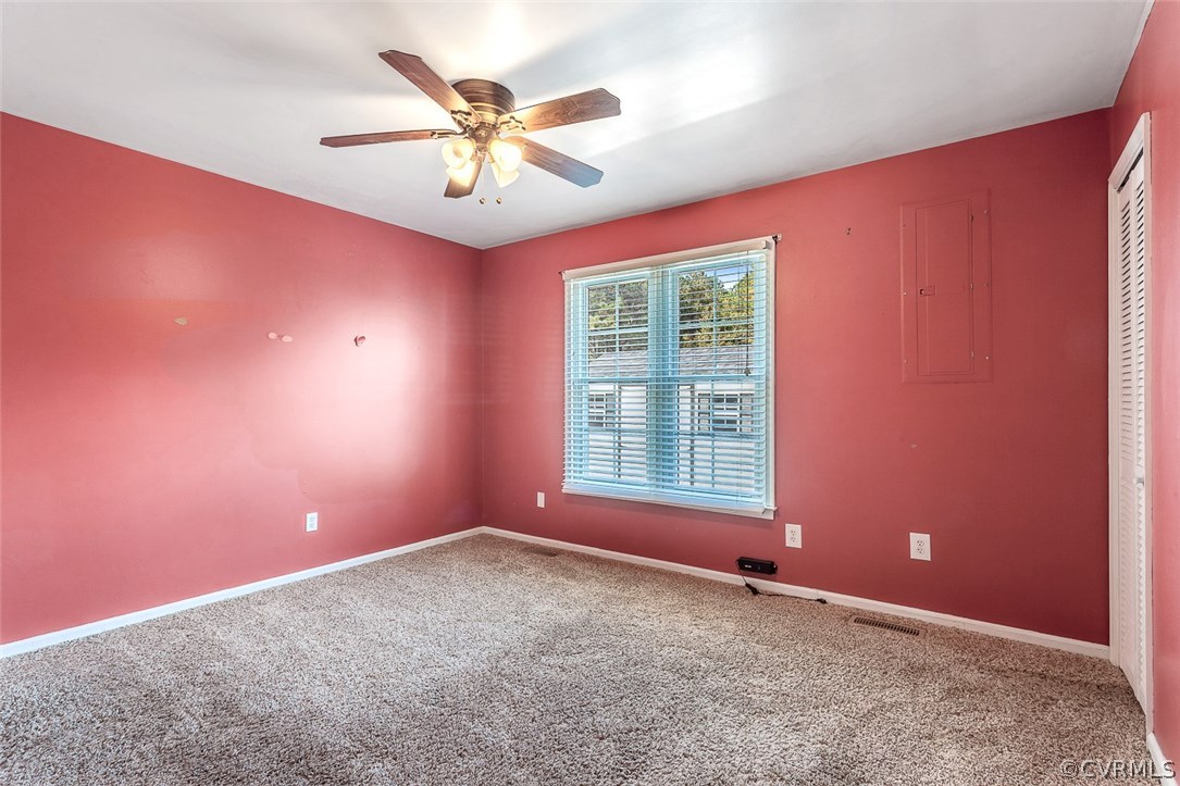2912 Fielding Road Chester, VA 23831 - Photo 16 of 23 an empty room with windows and fan