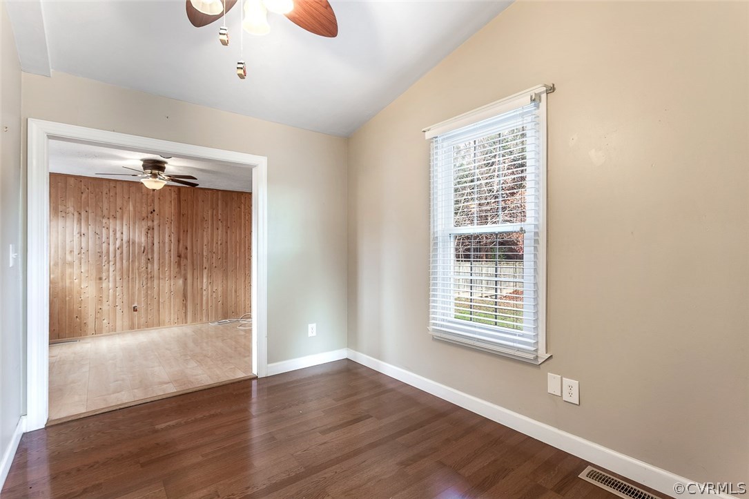 2912 Fielding Road Chester, VA 23831 - Photo 8 of 23 a view of an empty room with wooden floor and a window